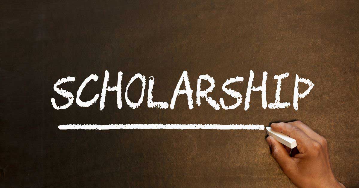 Scholarship written by chalk on a board